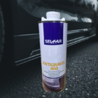 ANTI GRAVILLON BLANC 1 - PredaColor Spray can labeled Antigravel 460 for stonechip protection placed on asphalt beside a parked car.