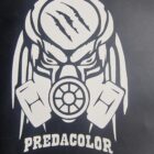 POCHOIR - PredaColor White stylized gas-mask logo on a dark background, with the text PREDACOLOR beneath.