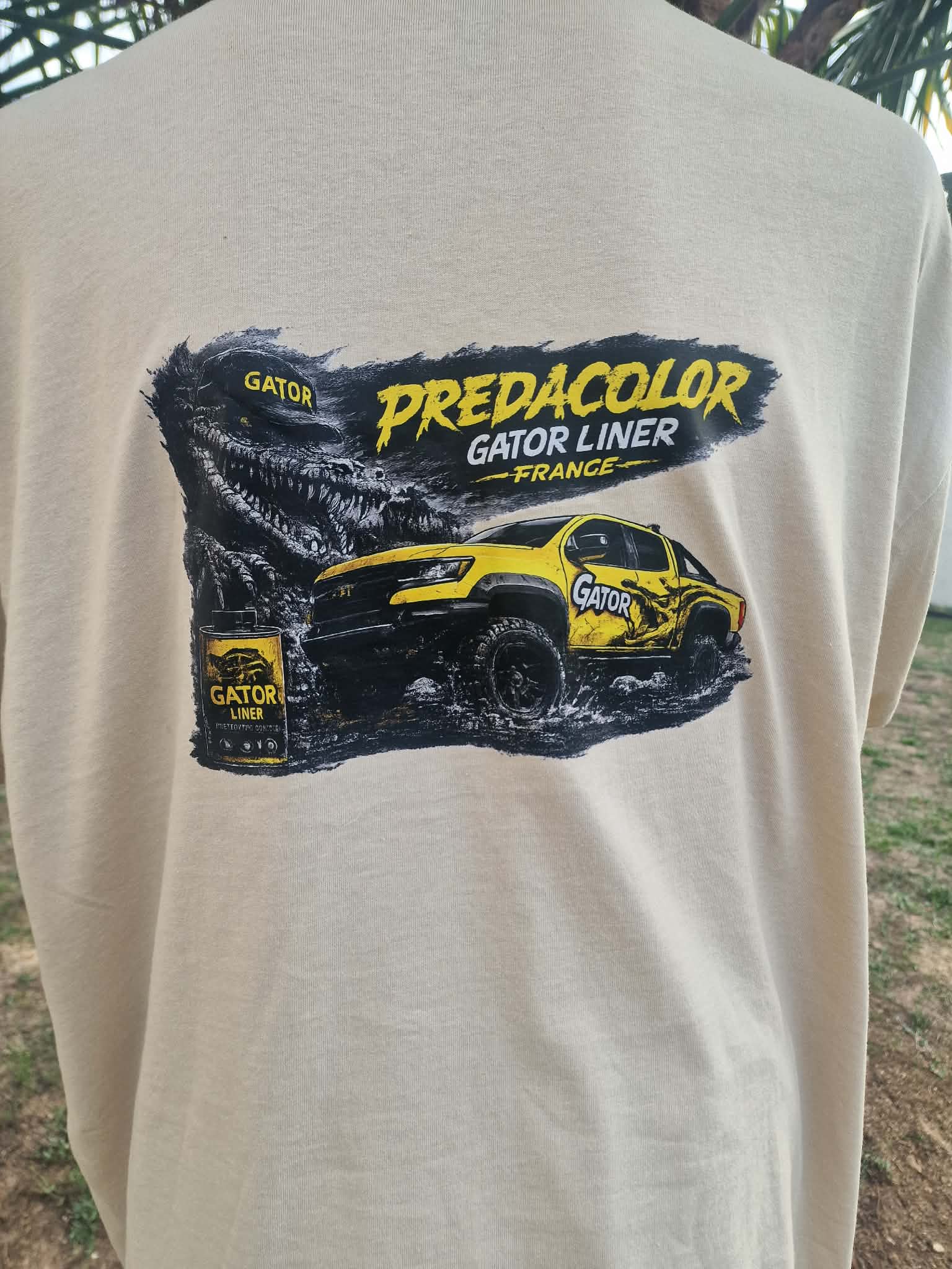 2 1 DOS - PredaColor Beige T‑shirt with a graphic: a yellow Gator truck, black gator illustration, and the text 'Predicolor Gator Liner France'.